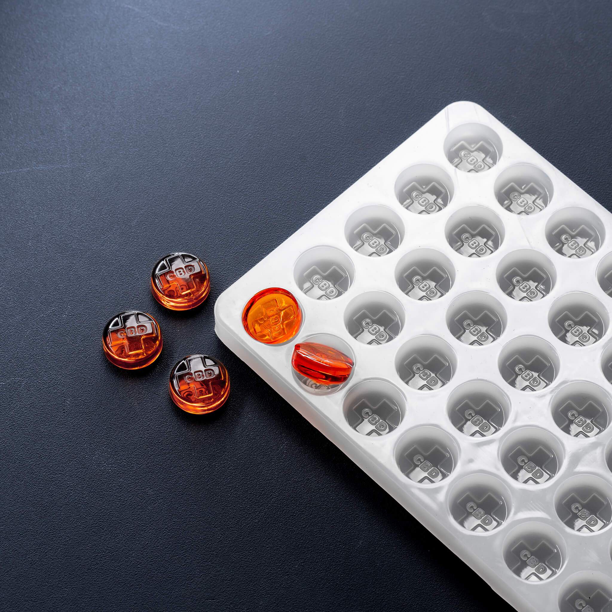 2.8mLRoundCandyDepositorMoldCBDsymbol50Cavities100PercentSiliconeOrangeGummies