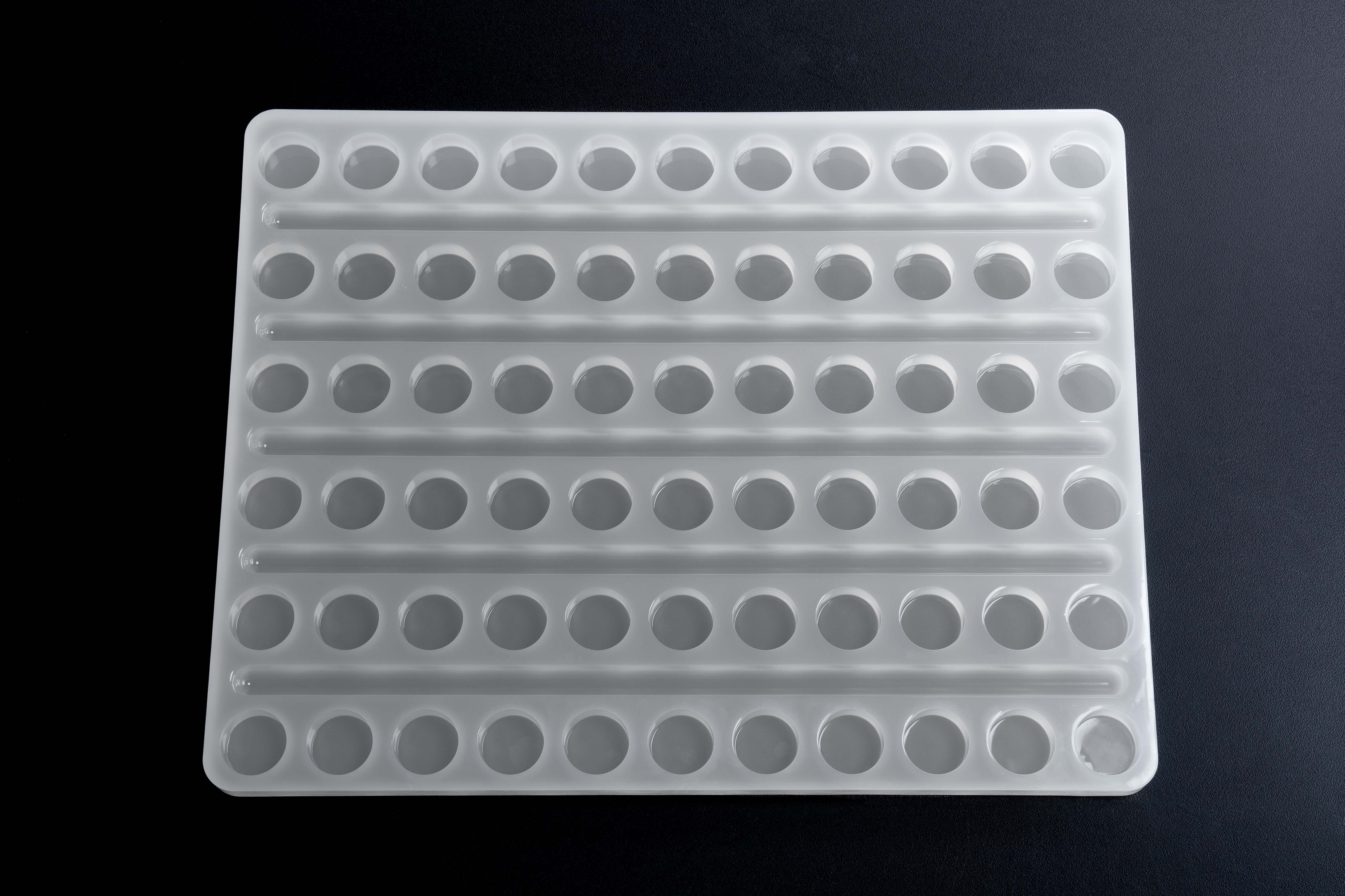 5.35mL Round Candy and Gummy Rope Mold - 66 Cavities - 22115