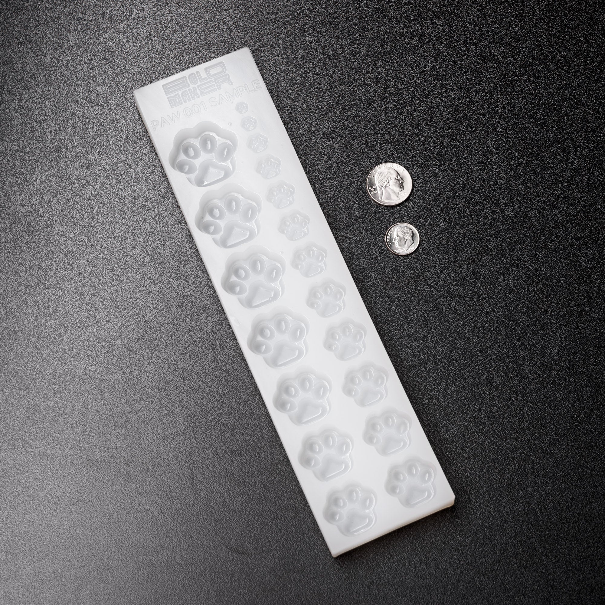 0.05 - 10mL Paw Print Sampler Candy Mold - 19 Cavities - 23423