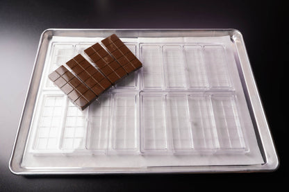 4 Dubai Chocolate Bar Molds, with Chocolate Samples on a Stainless Steel Tray