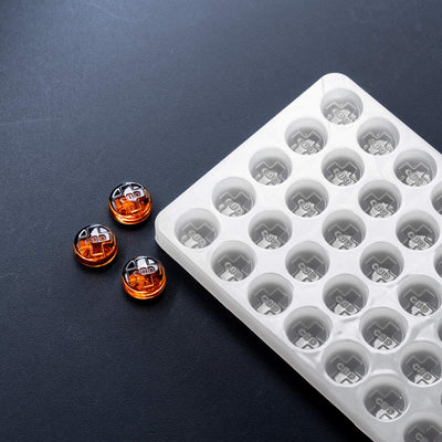 2.8mLRoundCandyDepositorMoldCBDsymbol50Cavities100PercentSiliconeOrangeGummiesBlackBackground