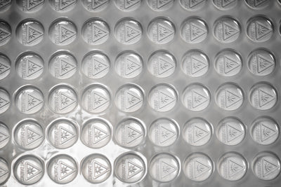 Closeup3.5mLRoundCandyGummyDepositorMoldMassachusettsMaineRhodeIslandTHCTriangleSymbol88Cavities100PercentPlatinumSilicone