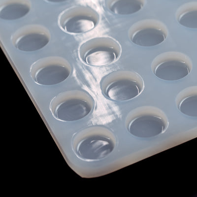 CornerblackBackground3mLDiscCandyGummyDepositorMoldPlain64Cavities100PercentPlatinumSilicone